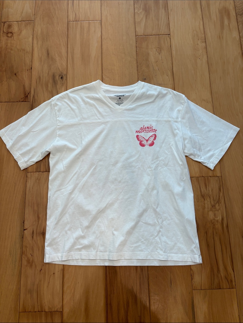 Junk Food Clothing White V-Neck Tee with Pink Butterfly Graphic